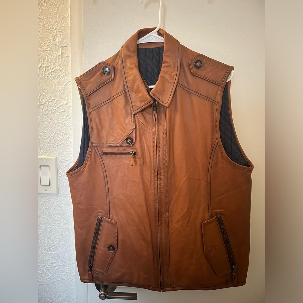Comstock & Co. woodsman genuine leather & nylon reversible vest. Size 42 (large)